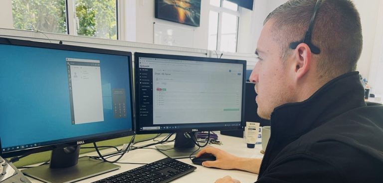 Daniel working on a support ticket for a client